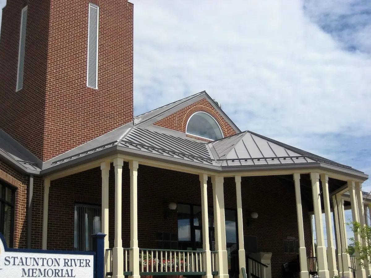 Skilled roofing craftsmen working on a residential roof in Braysville